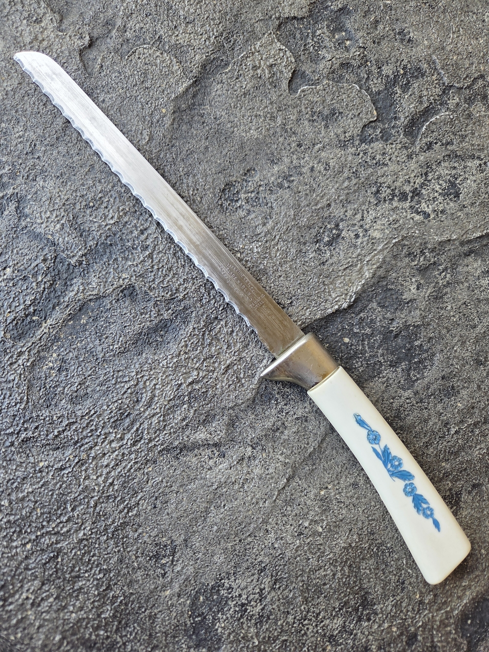 Cornflower Blue Lifetime Cutlery Serrated Table Knife with White Floral Handle
